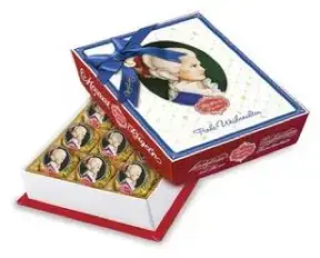  Набор конфет Reber Mozart с молочным шоколадом и новогодней открыткой, 240 г